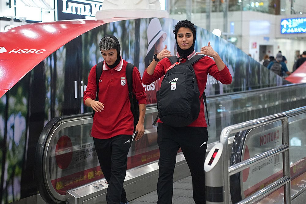 Members of Iran's women's football team arrive at the Kuala Lumpur International Airport in Sepang, Malaysia. - | Photo: AP/Azneal Ishak