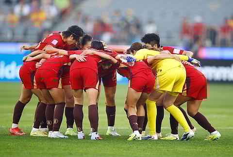 China embrace ahead of the Women's Asian Cup semifinal soccer match between China and Australia in Perth, Australia.