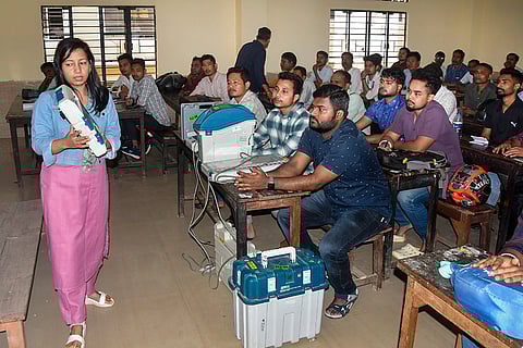 Polling personnel attend a training session organised by the district administration ahead of the Assam Legislative Assembly elections, in Guwahati.