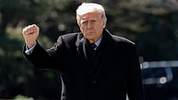 WADA's Potential Donald Trump Ban: World Anti-Doping Agency Delays Decision Until After FIFA World Cup 2026 AP : US President Donald Trump pumps his fist as he walks to depart on Marine One from the South Lawn of the White House.