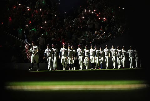 The United States team enters the field before the championship game of the World Baseball Classic against Venezuela, in Miami.