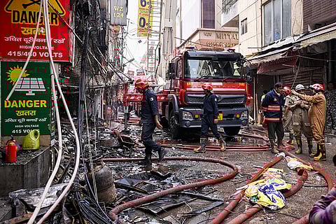 Rescue operations underway after a fire broke out in a residential building near Palam Metro station, in New Delhi. Seven people, including three children, were killed. 