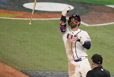 United States Bryce Harper throws his bat after hitting a home run during the eighth inning in the championship game of the World Baseball Classic against Venezuela, in Miami. 