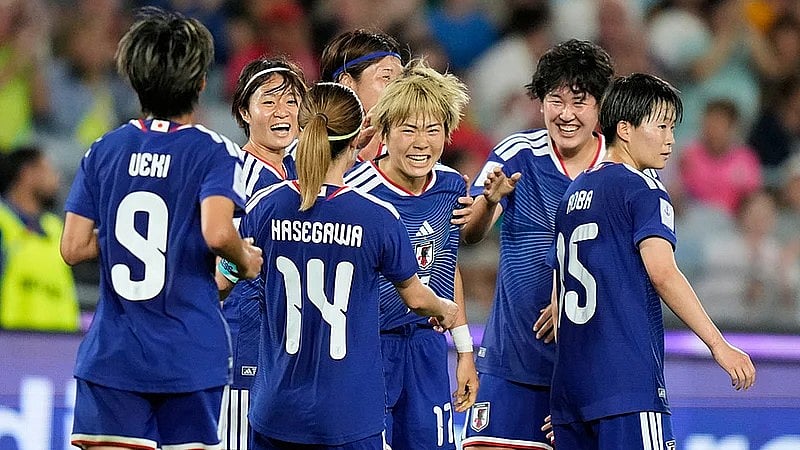 Japan's Maika Hamano, centre, is congratulated by teammates after scoring her team's second goal during the AFC Women's Asian Cup semi-final between Japan and South Korea in Sydney. - AP