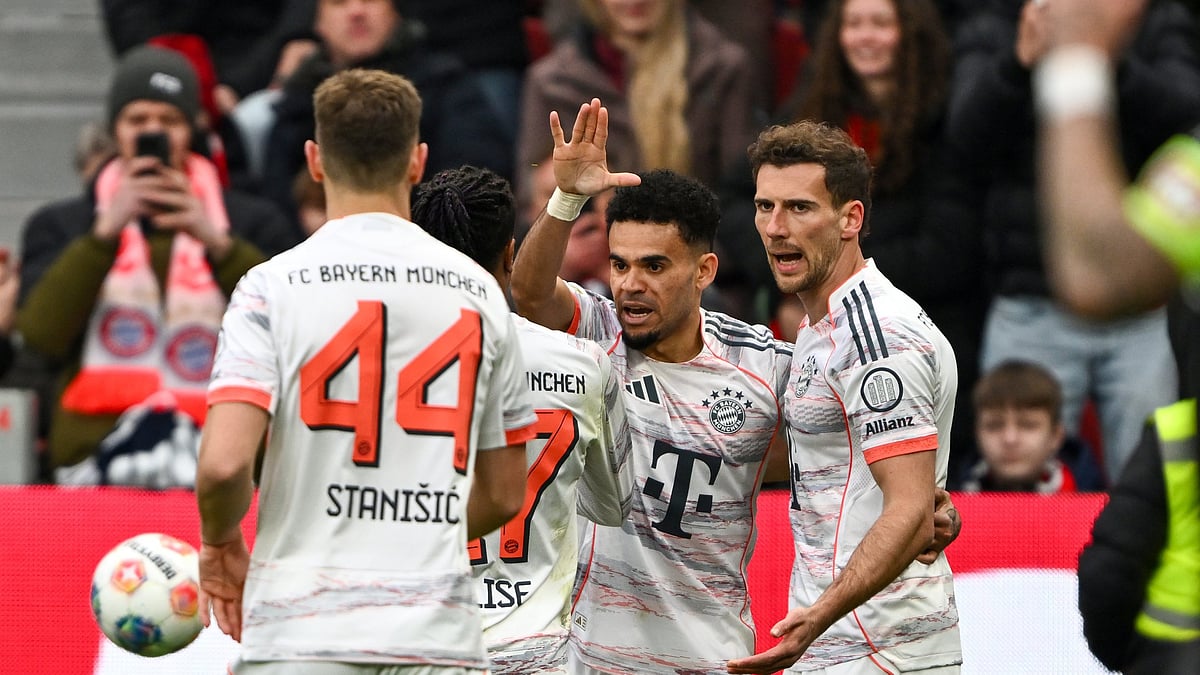 Bayern Munich footballers in action against Bayer Leverkusen in Bundesliga 2025-26.  - FCBayern/X