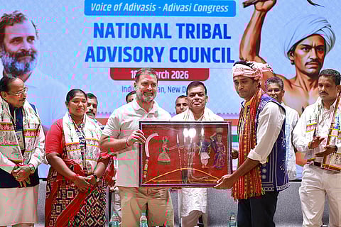 In this image received on March 18, 2026, Leader of Opposition in Lok Sabha Rahul Gandhi is felicitated during a meeting of the National Tribal Advisory Council convened by the All India Adivasi Congress at Indira Bhawan, in New Delhi.