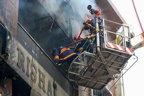 Rescue operations underway after a fire broke out in a residential building near Palam Metro station, in New Delhi. Seven people, including three children, were killed.