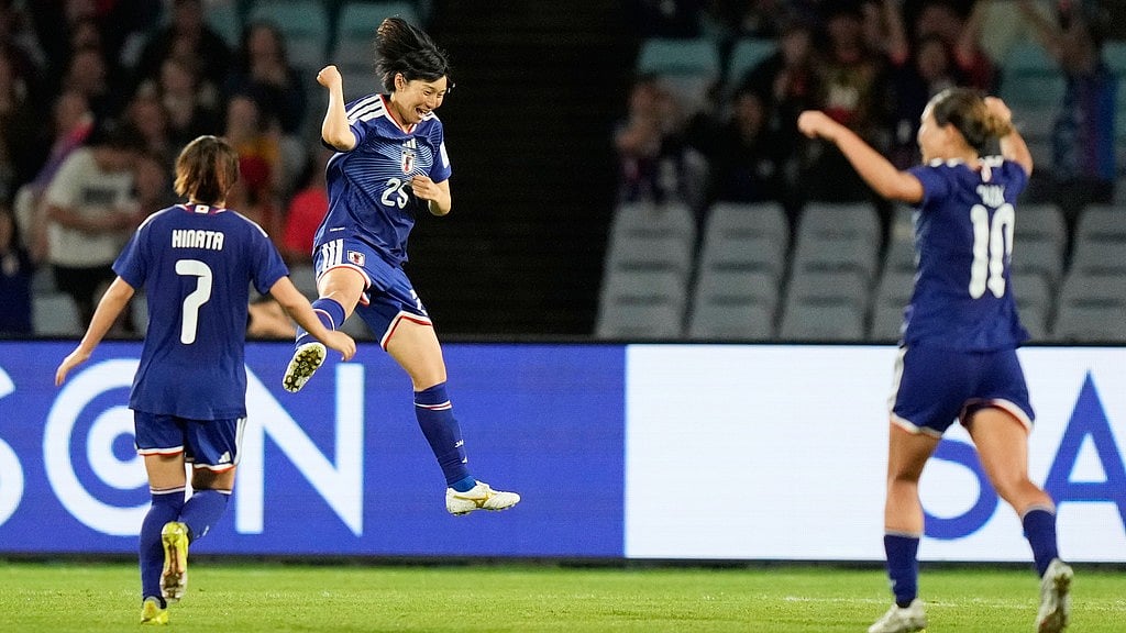 Japan's Remina Chiba, centre, celebrates after scoring her team's fourth goal during the Women's Asian Cup semi-final between Japan and South Korea in Sydney. - Photo: AP