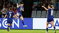 Photo: AP : Japan's Remina Chiba, centre, celebrates after scoring her team's fourth goal during the Women's Asian Cup semi-final between Japan and South Korea in Sydney.
