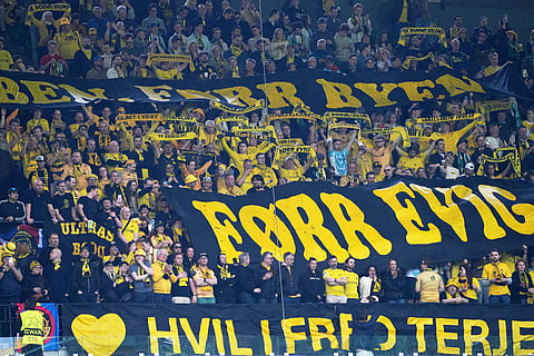Bodo Glimt supporters cheer before a Champions League round of 16 second leg soccer match between Sporting CP and Bodo Glimt in Lisbon, Portugal.