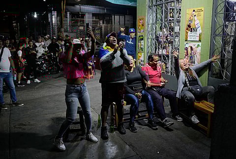 Venezuela fans watch the championship match of the World Classic Baseball between the United States and Venezuela, in Caracas, Venezuela.