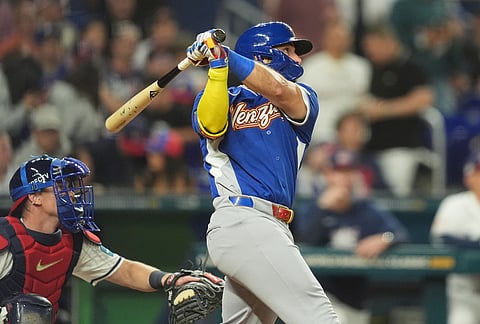 Venezuela Wilyer Abreu hits a home run during the fifth inning in the championship game of the World Baseball Classic against the United States, in Miami. 