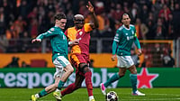 Liverpool Vs Galatasaray LIVE Score, Champions League RO16: Reds Seek To Overturn First Leg Deficit At Anfield | Photo: AP/Khalil Hamra : Liverpool's Alexis Mac Allister, left, vies for the ball with Galatasaray's Victor Osimhen during a Champions League round of 16 first leg soccer match between Galatasaray and Liverpool, in Istanbul, Turkey.