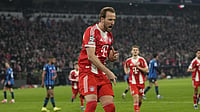 FCBayern/X : Harry Kane celebrates after scoring a brace against Atalanta during UEFA Champions League 2025-26 round of 16 match. 