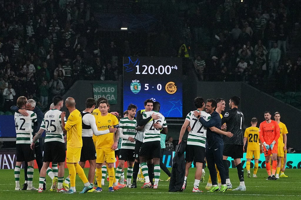 Players greet after a Champions League round of 16 second leg soccer match between Sporting CP and Bodo Glimt in Lisbon, Portugal. - | Photo: AP/Ana Brigida