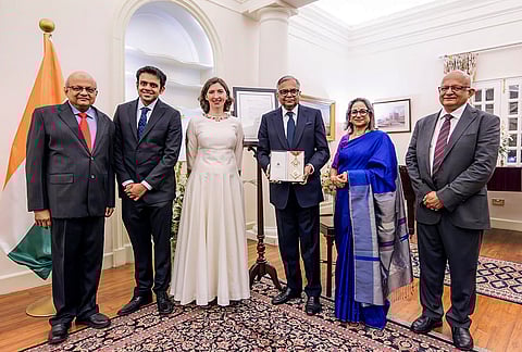 Chairman of the Tata Group Natarajan Chandrasekaran, third right, with British High Commissioner to India Lindy Cameron, third left, and others, poses after receiving the insignia of Knight Commander of the Most Excellent Order of the British Empire (KBE), in New Delhi. 