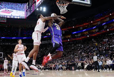 Los Angeles Lakers' LeBron James (23) is fouled by Houston Rockets' Jabari Smith Jr. during the second half of an NBA basketball game in Houston.