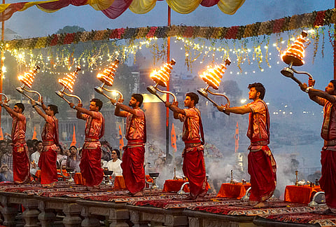 Priests perform the Ganga Aarti at Assi Ghat on the occassion of Hindu New Year and first day of the 'Navaratri' festival, in Varanasi.