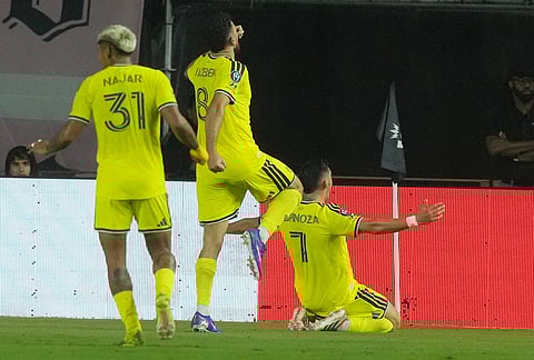 Nashville SC forward Cristian Espinoza (7) celebrates his goals during the second half of a CONCACAF Champions Cup Round of 16 soccer match against Inter Miami, in Fort Lauderdale, Florida.