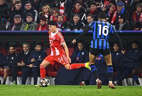 Bayern Munich's Deniz Ofli shoots the ball against Atalanta Bergamo, in Munich, Germany.