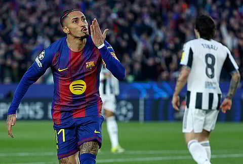 Barcelona's Raphinha celebrates after scoring the opening goal of his team during the Champions League round of 16, second leg soccer match between FC Barcelona and Newcastle United FC in Barcelona, Spain.