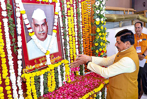 Madhya Pradesh Chief Minister Mohan Yadav pays tributes to former state Assembly Speaker Kunji Lal Dubey to celebrate his birth anniversary, in Bhopal, Madhya Pradesh.