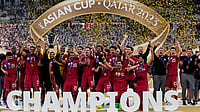 AFC Scraps Men's Asian Cup Hosting Bids For 2031, 2035 To Meet FIFA's 'Even' Request File/AP : The Qatar team poses with the trophy at the end of the Asian Cup 2023 final between Qatar and Jordan at the Lusail Stadium in Lusail.