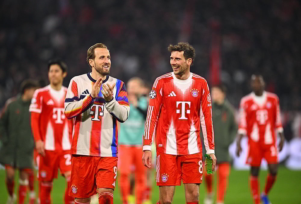 Bayern Munich's Harry Kane and Leon Goretzka react after a match against Atalanta Bergamo in Munich, Germany. - | Photo: Tom Weller/dpa via AP