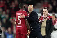 | Photo: AP/Jon Super : Liverpool's manager Arne Slot, center, celebrates with Liverpool's Ibrahima Konate at the end of the second leg of the Champions League round of 16 soccer match between Liverpool and Galatasaray, in Liverpool, England.