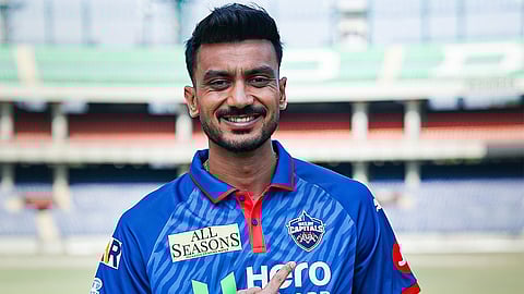 Delhi Capitals captain Axar Patel poses for a photo at the jersey launch.