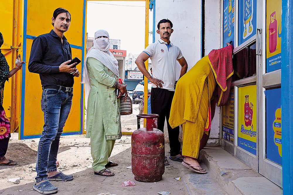 A Long Wait: People queue up for LPG cylindars in Badhkal, rural Faridabad - | Photo: Vikram Sharma