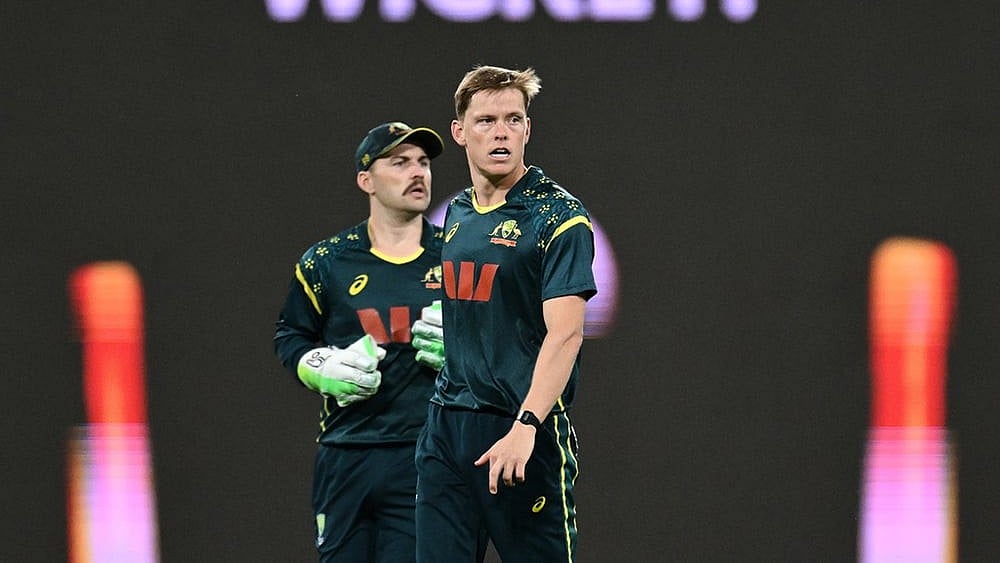 Australian bowler Nathan Ellis reacts after dismissing Indian batsman Shubman Gill during a T20 cricket international between India and Australia in Carrara, Australia. - | Photo: Dave Hunt/AAPImage via AP