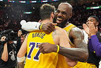 Miami Heat Vs Los Angeles Lakers, NBA 2026: Doncic’s 60-Point Masterclass Powers Lakers To 134-126 Win | Photo: AP/Lynne Sladky : Los Angeles Lakers guard Luka Doncic (77) and forward LeBron James, right, embrace after defeating the Miami Heat in an NBA basketball game, in Miami.