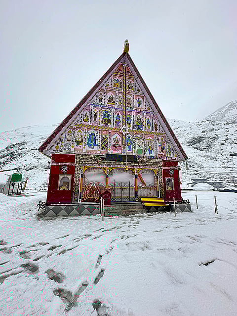 A view of Machail Mata Temple covered in fresh snowfall at Padder Gulabgarh, in Kishtwar district of Jammu and Kashmir.