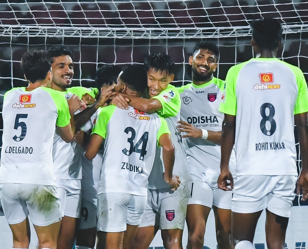 Odisha FC footballers celebrating a goal against NorthEast United in ISL 2025-26.  - IndSuperLeague/X