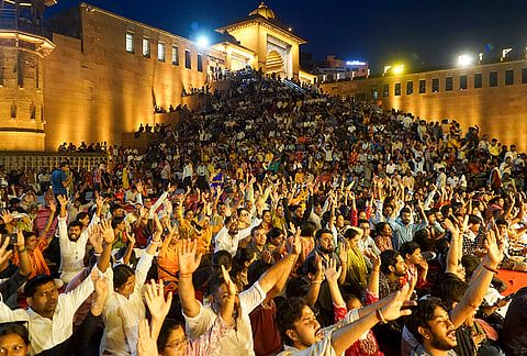 People take part in Ganga Aarti on the first day of Hindu New Year and Chaitra Navratri at Lalita Ghat, near Kashi Vishwanath Dham, in Varanasi.