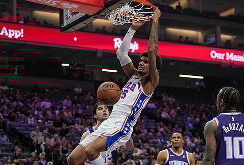 Philadelphia 76ers forward Dominick Barlow dunks the ball during the first half of an NBA basketball game against the Sacramento Kings, in Sacramento, California. 