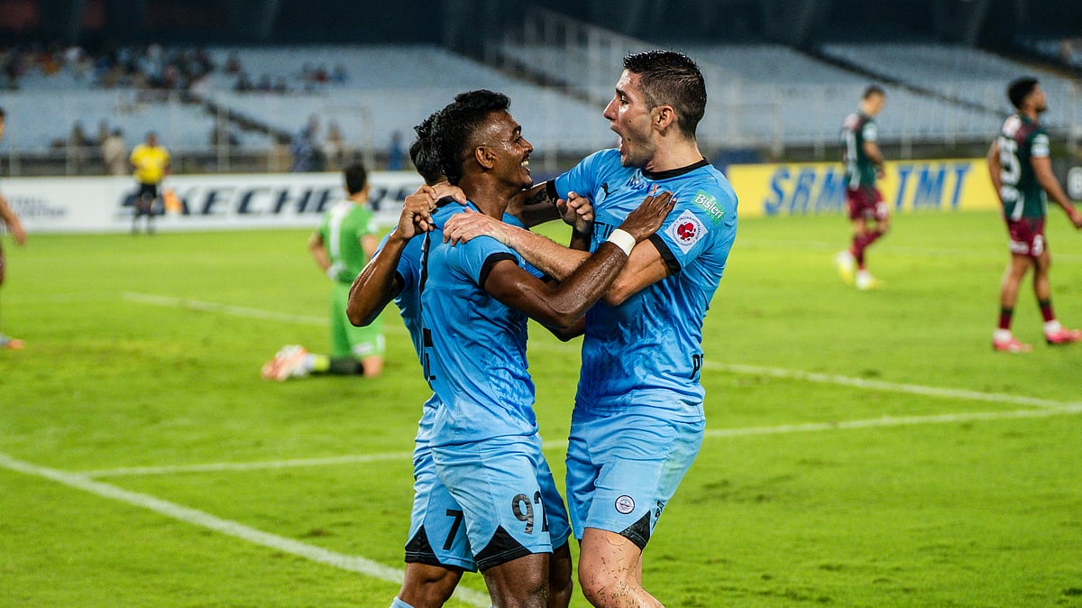 Mumbai City FC players celebrate after scoring a goal against Mohun Bagan during ISL 2025-26.  - AIFF