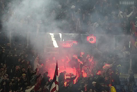 Bologna fans celebrate after the Europa League round of 16 second leg soccer match between Roma and Bologna in Rome, Italy.