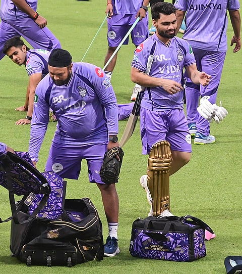 Kolkata Knight Riders' Rinku Singh, right, and others during a practice session ahead of IPL at Eden Gardens, in Kolkata.
