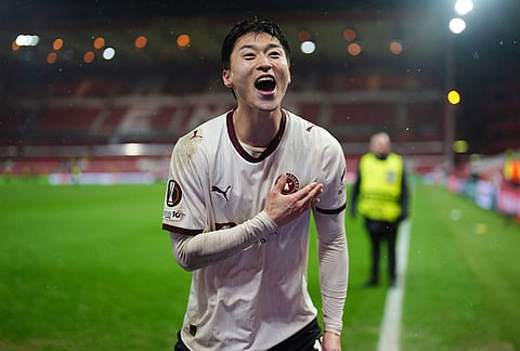 Midtjylland's Gue-Sung Cho celebrates after the Europa League round of 16, first leg soccer match between Nottingham Forest and FC Midtjylland in Nottingham, England.