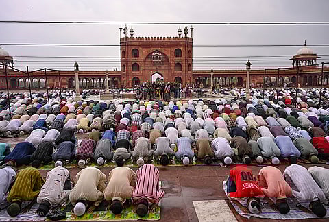People offer prayers at Jama Masjid ahead of the Eid Al-Fitr festival celebrations, in New Delhi, Friday, March 20, 2026. 