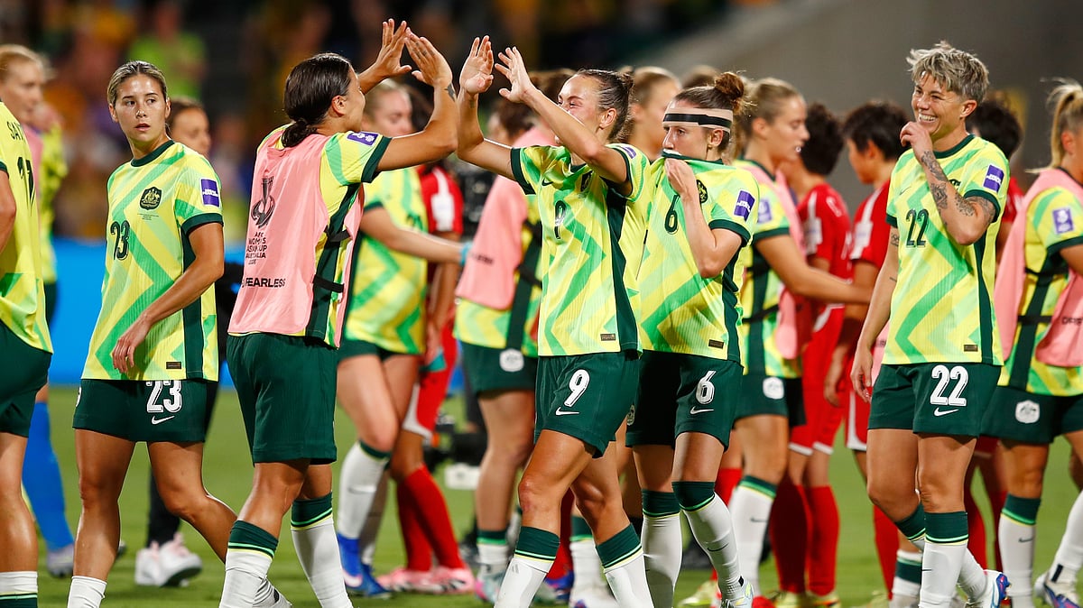 Australia's Sam Kerr and teammate Australia's Caitlin Foord celebrate following the Women's Asian Cup quarterfinal soccer match between Australia and North Korea in Perth, Australia, Friday, March 13, 2026.  - (AP Photo/Gary Day)