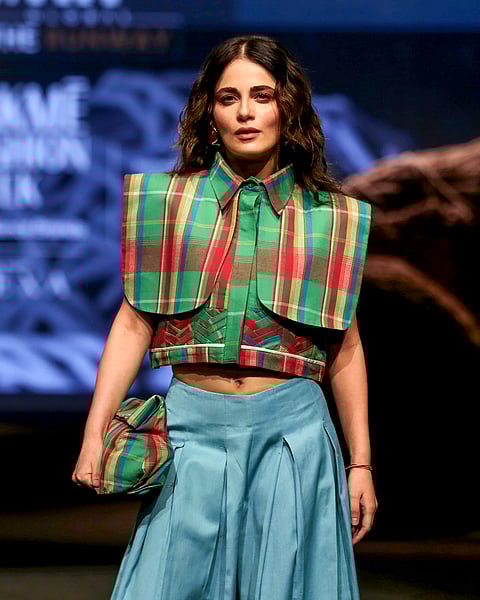 A model walks the ramp during the Fashion Design Council of India (FDCI) X Lakme Fashion Week (LFW), in Mumbai.