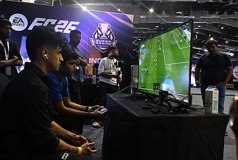 Competitors face off in the FC 26 tournament area. The Mumbai event saw gamers from across India travel to NESCO to compete for a professional franchise spot