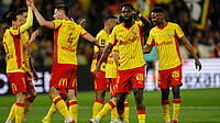 Lens 5-1 Angers, Ligue 1: Thauvin Fires Hosts To Comfortable Win | Photo: AP/Jean-Francois BADIAS : Lens' Edouard Odsonne (11) celebrates with teammates after scoring during the French League One soccer game between Lens and Angers, Friday, March 20,2 026, in Lens, France.