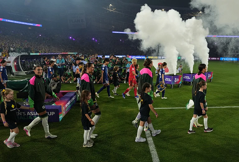 Australia's team enters the field during the Women's Asian Cup soccer final between Japan and Australia in Sydney. - | Photo: AP/Mark Baker