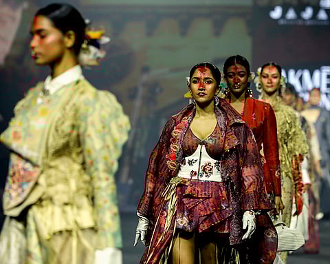 Models showcase the creation of designer Jajaabor during the Lakme Fashion Week (LFW), in Mumbai.
