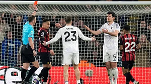| Photo: AP/Andrew Matthews : Manchester United's Harry Maguire is sent off during an English Premier League match against AFC Bournemouth, Friday, March 20, 2026, in Bournemouth, England.