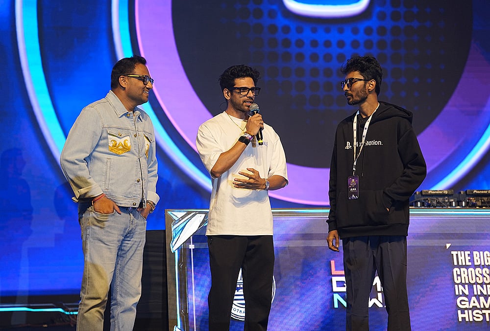Founders Gautam Badalia (left) and Santanu Basu (right), alongside event host Ocean Sharma (center), address the crowd at NESCO, Mumbai, during the opening leg of the Indian Super Gaming League (ISGL) city qual - | Photo: Special Arrangement